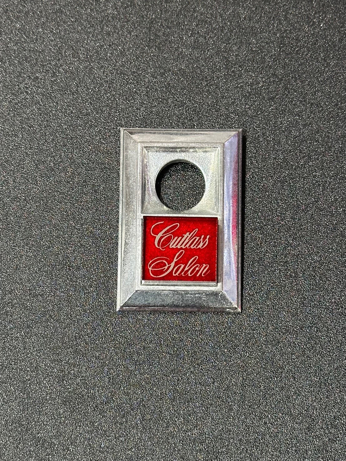 Oldsmobile Cutlass Supreme Brougham Trunk Lock Cover Insert Emblem Reproduction Mirror Red and Silver