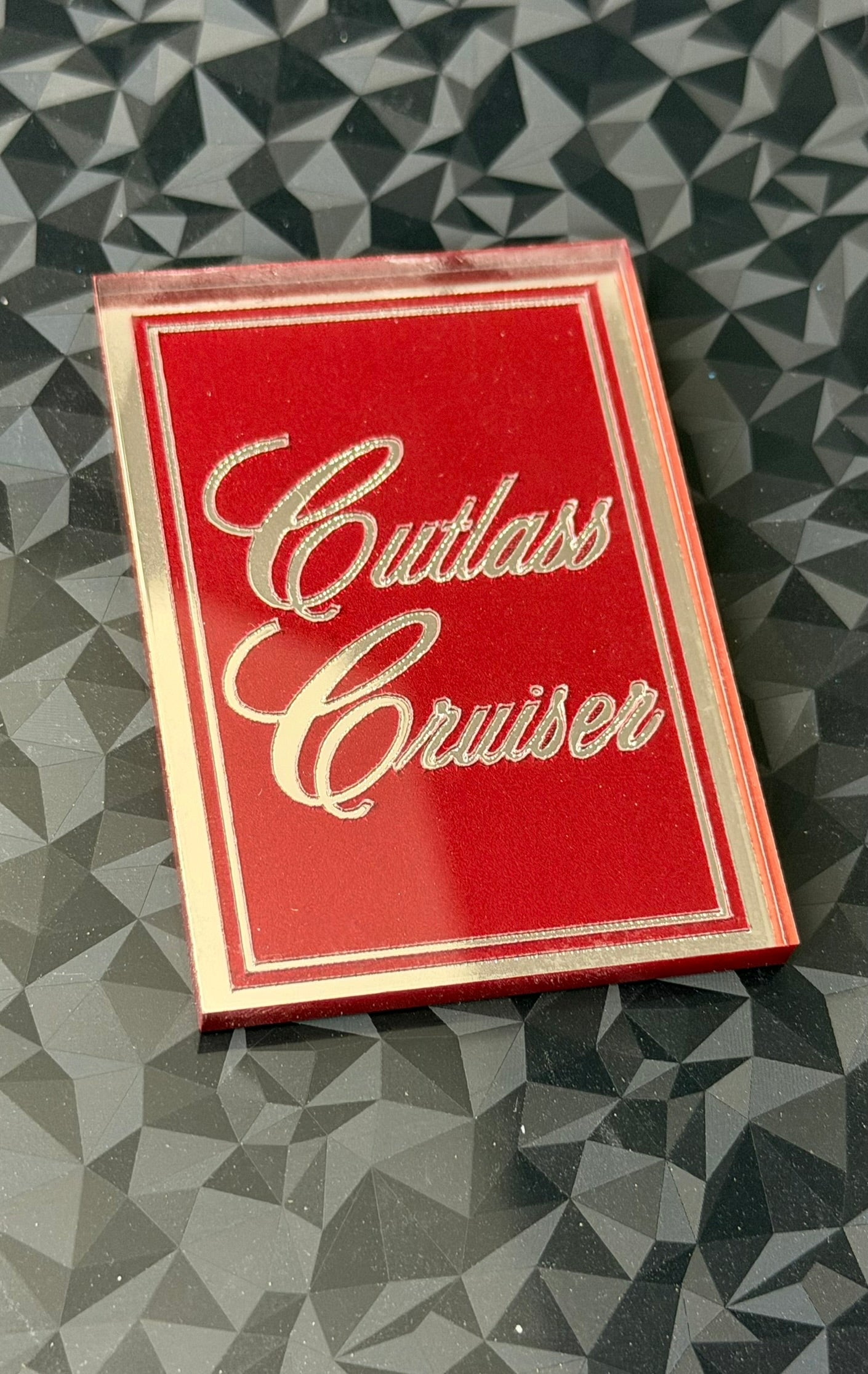 1978 1979 Oldsmobile Cutlass Cruiser Header Panel Emblem Red and Chrome